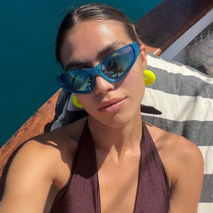 Shop 'Pluto' Rimless Y2K Sunglasses in Blue & Chrome