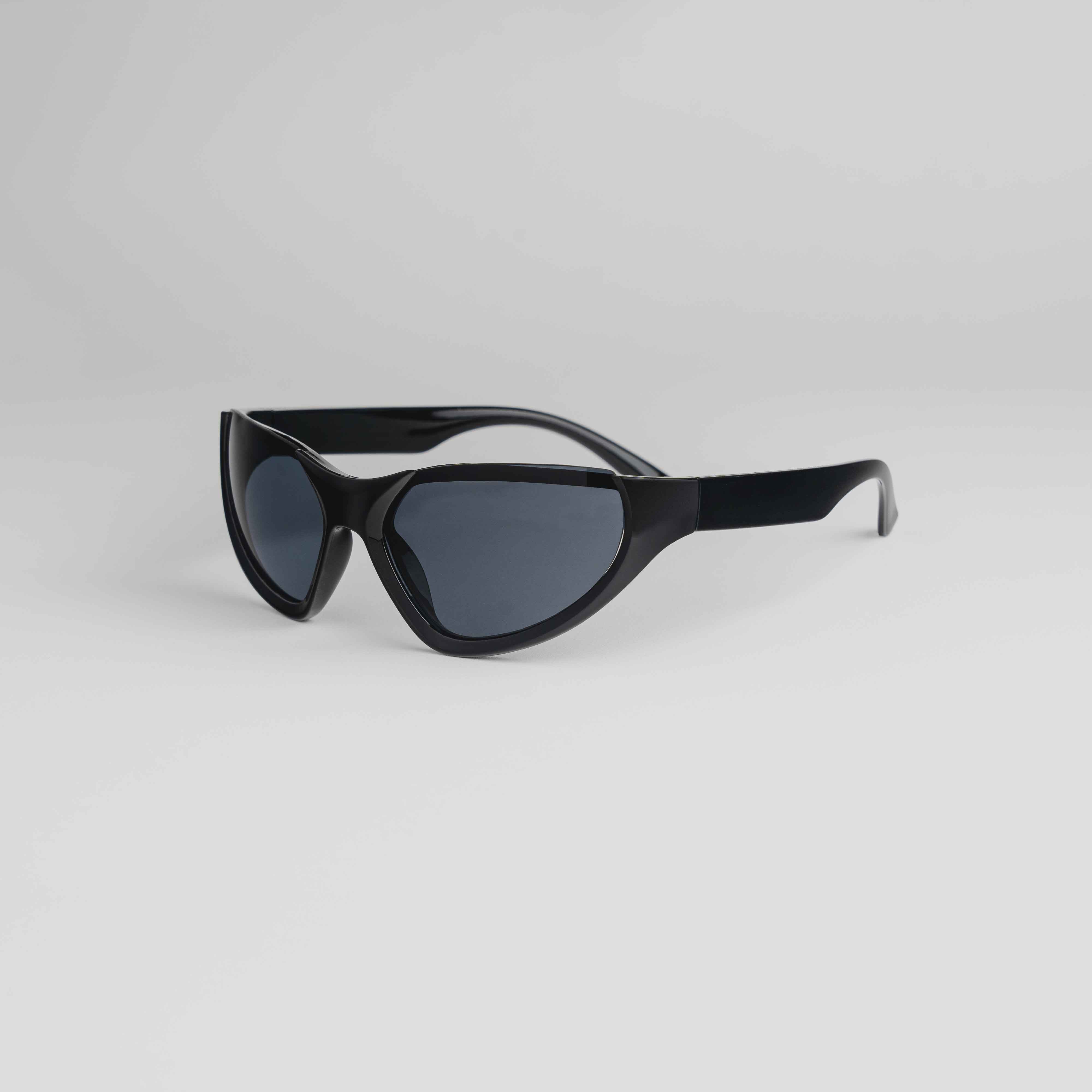 Shop 'Stunt Double' Rimless Y2K Sunglasses in Black & Chrome