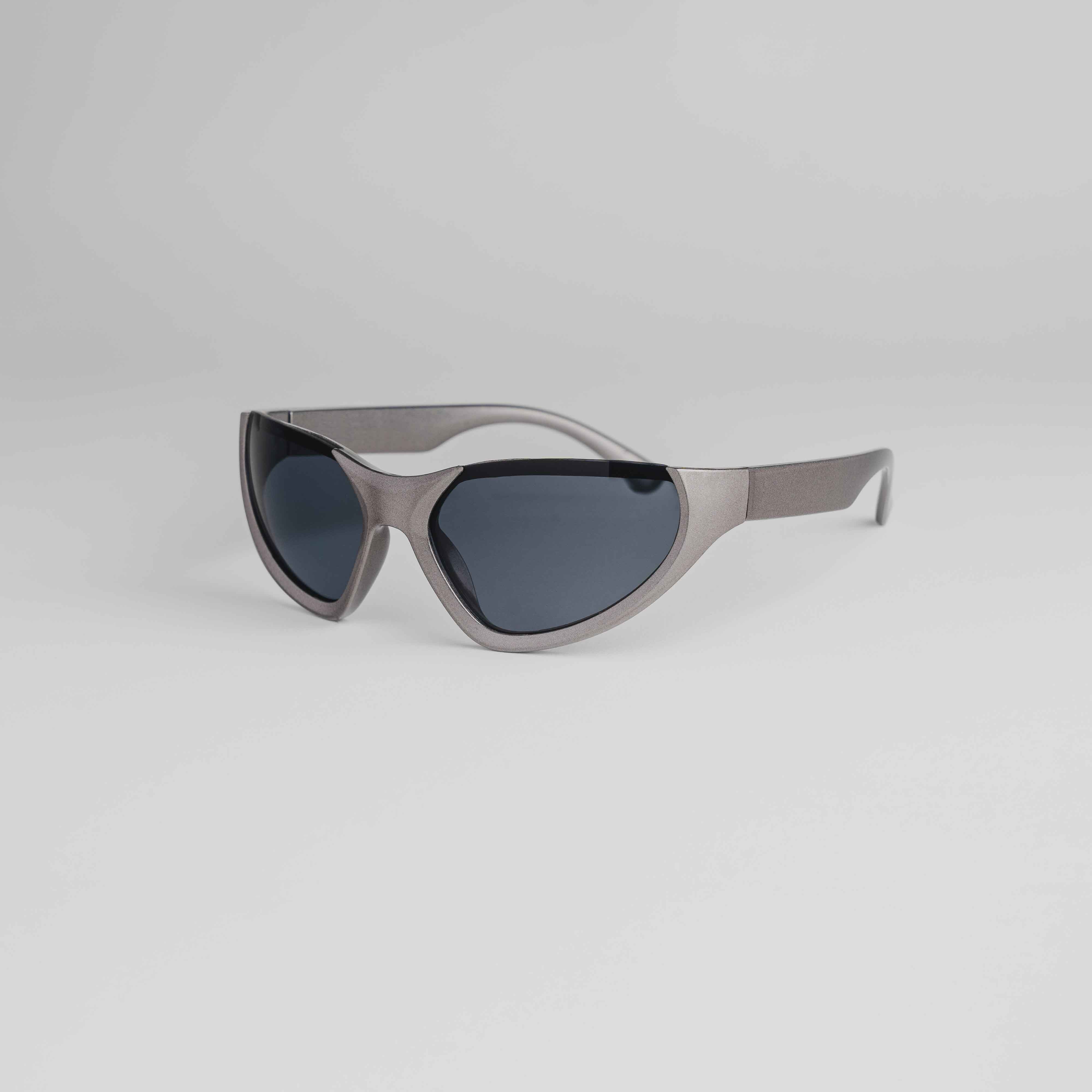 Shop 'Zephyr' Rimless Y2K Sunglasses in Gunmetal & Chrome